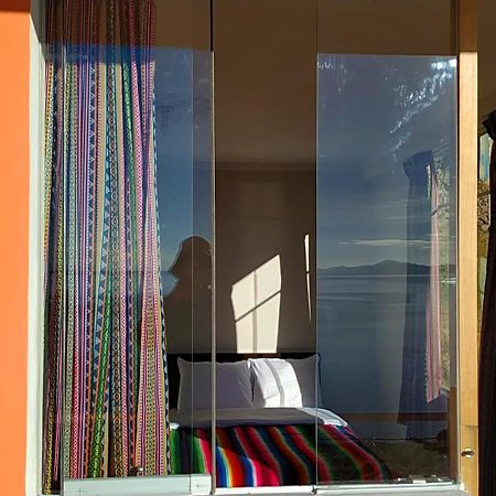 Tikawasi Homestay Comunidad Pueblo Isla Amantani Jose Luis Ocosuyo エクステリア 写真